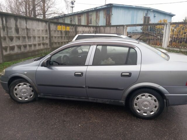 Серый Опель Астра, объемом двигателя 1.4 л и пробегом 256 тыс. км за 3200 $, фото 1 на Automoto.ua