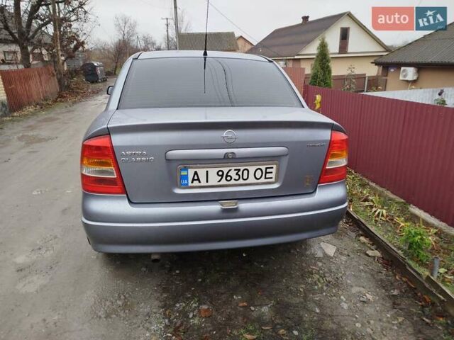 Серый Опель Астра, объемом двигателя 1.4 л и пробегом 197 тыс. км за 3350 $, фото 7 на Automoto.ua