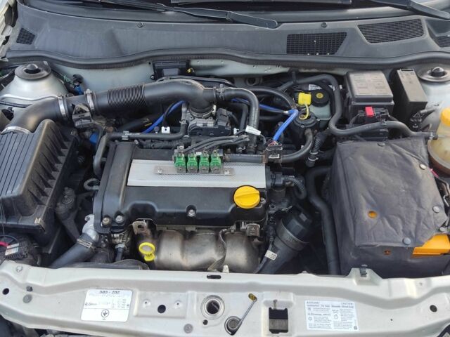 Серый Опель Астра, объемом двигателя 1.4 л и пробегом 338 тыс. км за 4100 $, фото 12 на Automoto.ua