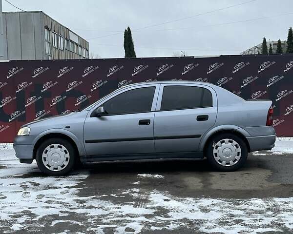 Серый Опель Астра, объемом двигателя 1.36 л и пробегом 186 тыс. км за 4400 $, фото 4 на Automoto.ua