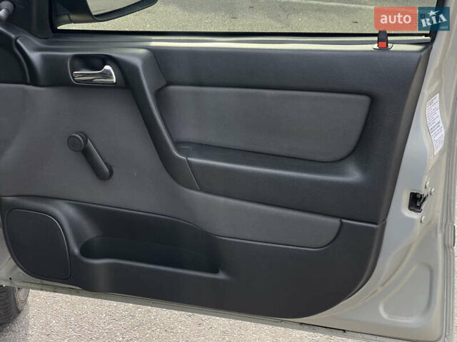 Серый Опель Астра, объемом двигателя 1.36 л и пробегом 77 тыс. км за 3999 $, фото 47 на Automoto.ua