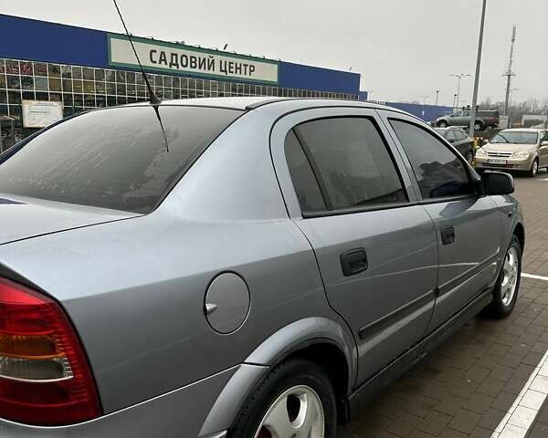 Серый Опель Астра, объемом двигателя 1.4 л и пробегом 185 тыс. км за 4500 $, фото 3 на Automoto.ua