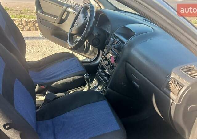 Серый Опель Астра, объемом двигателя 1.4 л и пробегом 400 тыс. км за 2300 $, фото 12 на Automoto.ua