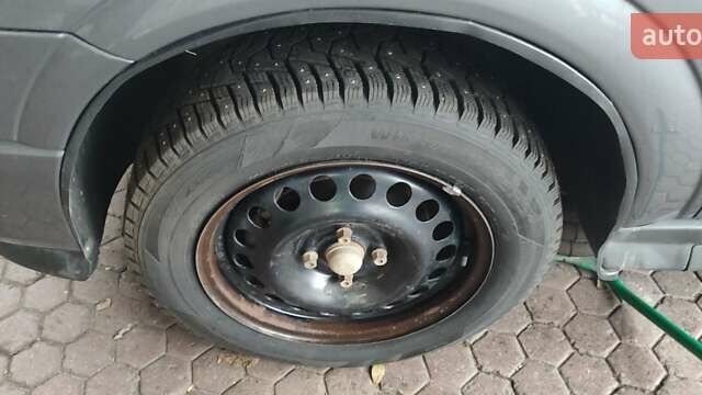 Серый Опель Астра, объемом двигателя 1.4 л и пробегом 156 тыс. км за 4500 $, фото 56 на Automoto.ua