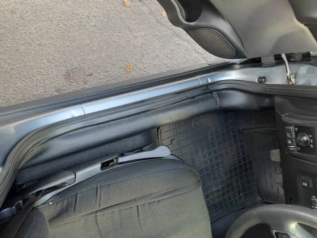 Серый Опель Астра, объемом двигателя 1.4 л и пробегом 282 тыс. км за 3700 $, фото 12 на Automoto.ua