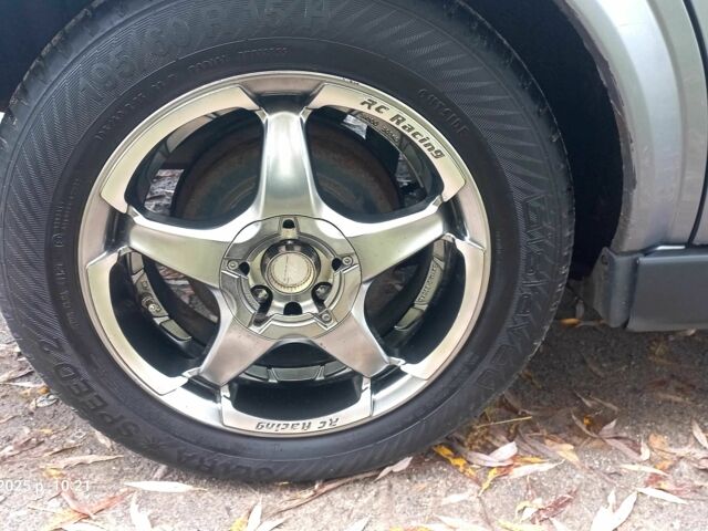 Серый Опель Астра, объемом двигателя 1.4 л и пробегом 212 тыс. км за 4200 $, фото 8 на Automoto.ua