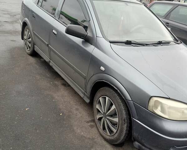 Серый Опель Астра, объемом двигателя 1.4 л и пробегом 201 тыс. км за 3100 $, фото 4 на Automoto.ua