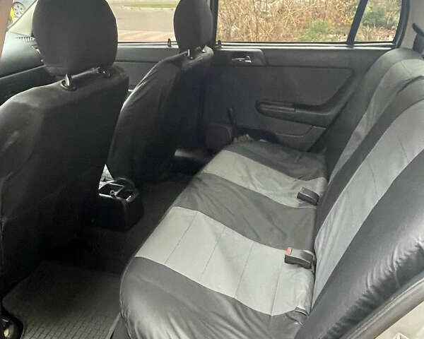 Серый Опель Астра, объемом двигателя 1.4 л и пробегом 213 тыс. км за 3600 $, фото 9 на Automoto.ua