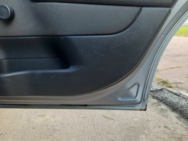 Серый Опель Астра, объемом двигателя 1.4 л и пробегом 282 тыс. км за 3700 $, фото 8 на Automoto.ua