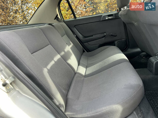 Серый Опель Астра, объемом двигателя 1.36 л и пробегом 77 тыс. км за 3999 $, фото 46 на Automoto.ua