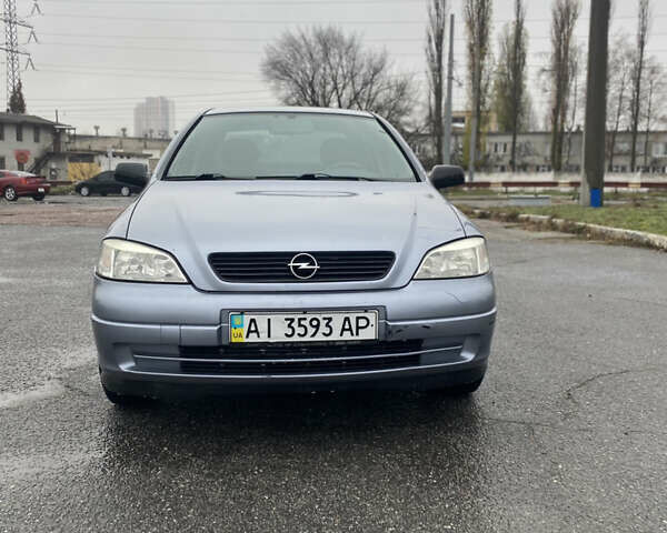 Серый Опель Астра, объемом двигателя 1.4 л и пробегом 283 тыс. км за 3200 $, фото 2 на Automoto.ua