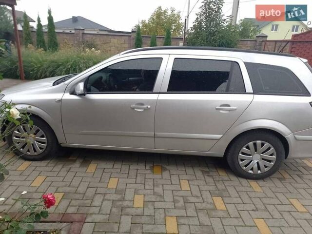 Сірий Опель Астра, об'ємом двигуна 1.25 л та пробігом 395 тис. км за 4300 $, фото 2 на Automoto.ua