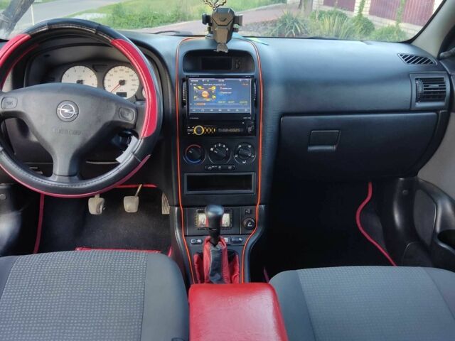 Серый Опель Астра, объемом двигателя 1.4 л и пробегом 338 тыс. км за 4100 $, фото 9 на Automoto.ua