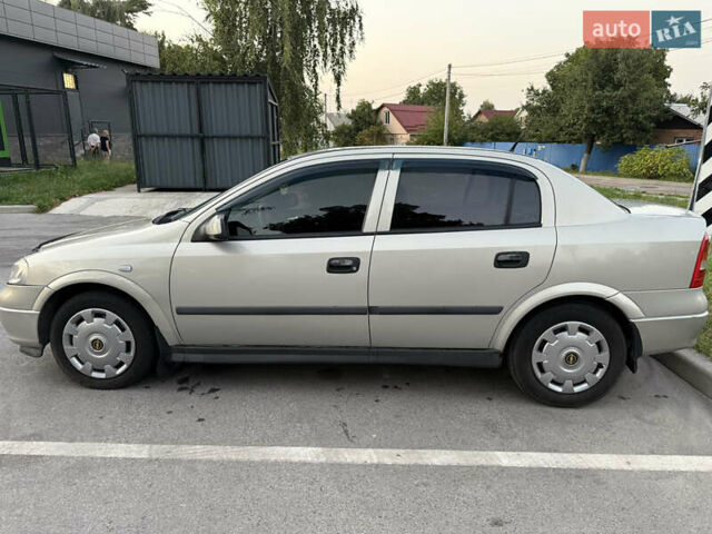 Сірий Опель Астра, об'ємом двигуна 1.39 л та пробігом 257 тис. км за 3100 $, фото 7 на Automoto.ua