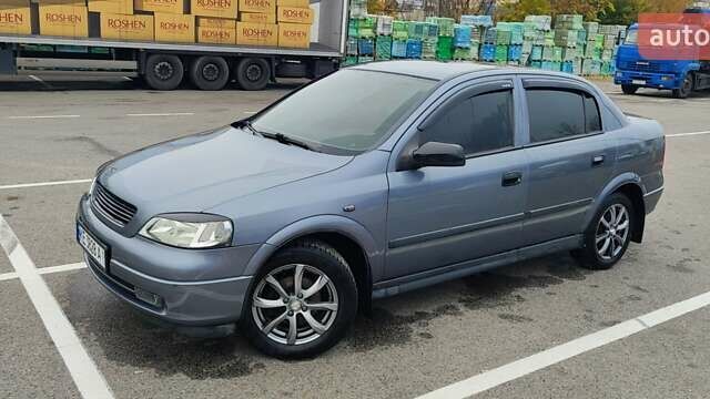 Серый Опель Астра, объемом двигателя 1.4 л и пробегом 156 тыс. км за 4500 $, фото 9 на Automoto.ua