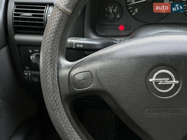 Серый Опель Астра, объемом двигателя 1.36 л и пробегом 77 тыс. км за 3999 $, фото 34 на Automoto.ua