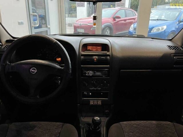 Сірий Опель Астра, об'ємом двигуна 1.4 л та пробігом 245 тис. км за 3650 $, фото 16 на Automoto.ua