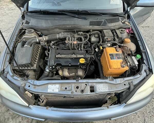 Серый Опель Астра, объемом двигателя 1.4 л и пробегом 228 тыс. км за 4000 $, фото 4 на Automoto.ua