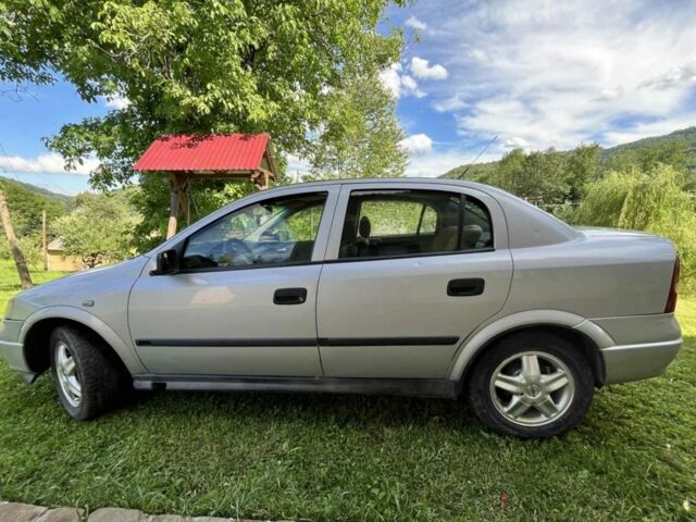 Серый Опель Астра, объемом двигателя 1.6 л и пробегом 170 тыс. км за 3100 $, фото 4 на Automoto.ua