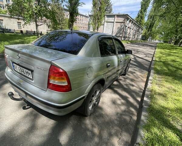 Серый Опель Астра, объемом двигателя 1.6 л и пробегом 176 тыс. км за 4750 $, фото 6 на Automoto.ua
