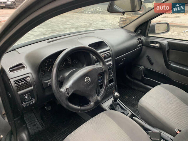 Серый Опель Астра, объемом двигателя 1.4 л и пробегом 216 тыс. км за 2650 $, фото 9 на Automoto.ua