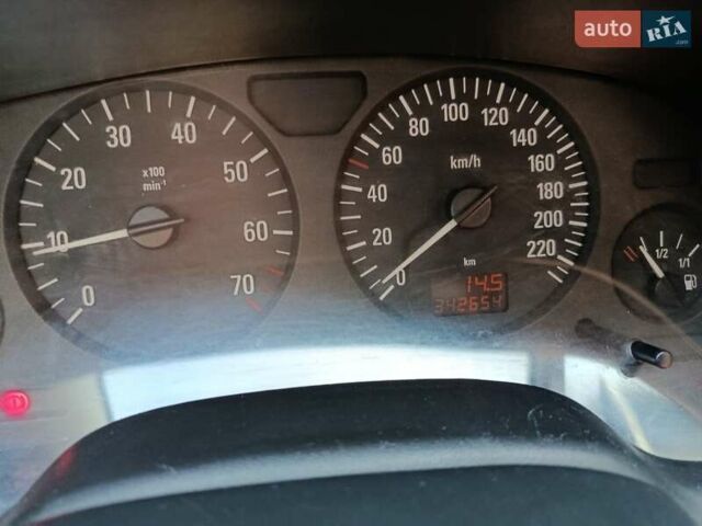 Серый Опель Астра, объемом двигателя 1.4 л и пробегом 342 тыс. км за 2200 $, фото 4 на Automoto.ua