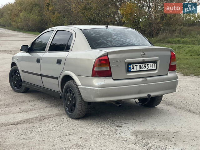 Серый Опель Астра, объемом двигателя 1.4 л и пробегом 350 тыс. км за 2399 $, фото 4 на Automoto.ua