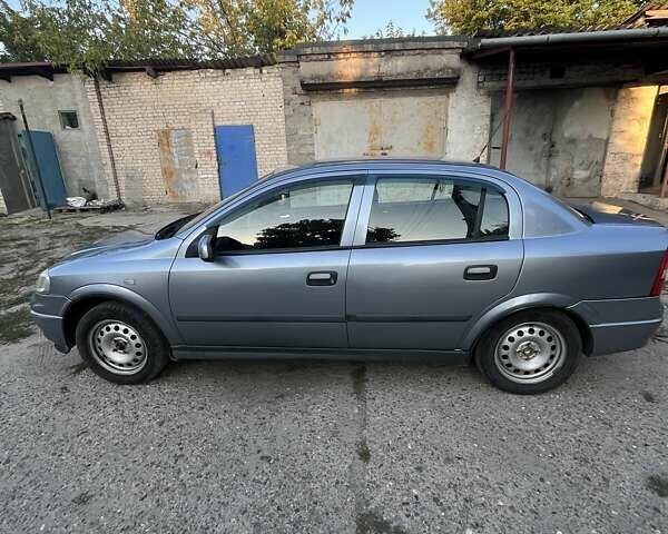 Серый Опель Астра, объемом двигателя 1.4 л и пробегом 228 тыс. км за 4000 $, фото 13 на Automoto.ua