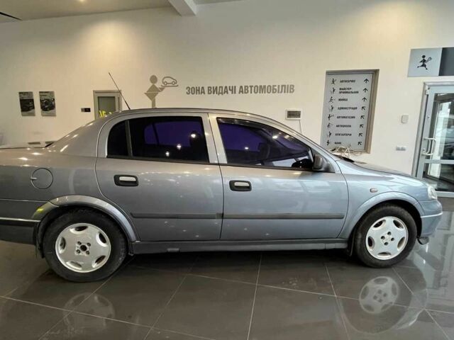 Сірий Опель Астра, об'ємом двигуна 1.4 л та пробігом 245 тис. км за 3650 $, фото 7 на Automoto.ua