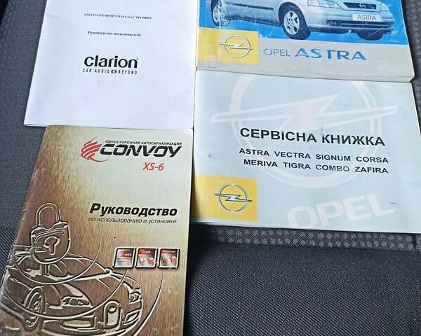 Серый Опель Астра, объемом двигателя 1.6 л и пробегом 59 тыс. км за 6999 $, фото 22 на Automoto.ua