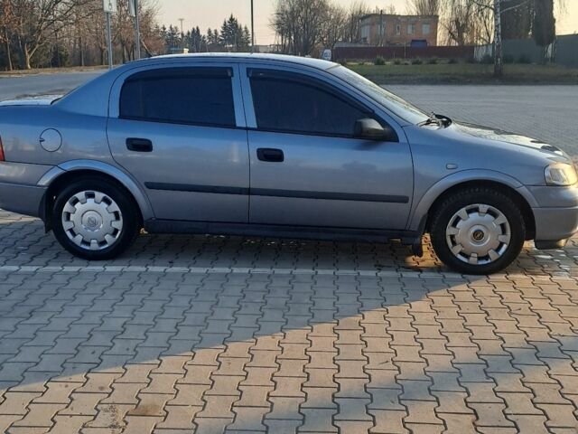 Серый Опель Астра, объемом двигателя 1.4 л и пробегом 173 тыс. км за 2900 $, фото 2 на Automoto.ua