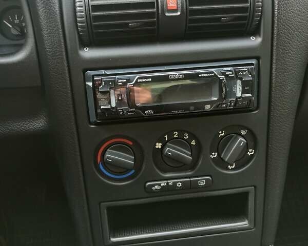 Серый Опель Астра, объемом двигателя 1.6 л и пробегом 59 тыс. км за 6999 $, фото 13 на Automoto.ua