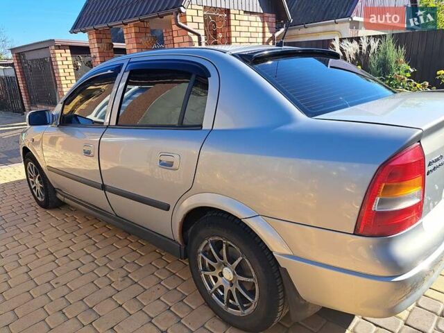 Серый Опель Астра, объемом двигателя 1.6 л и пробегом 300 тыс. км за 4600 $, фото 7 на Automoto.ua