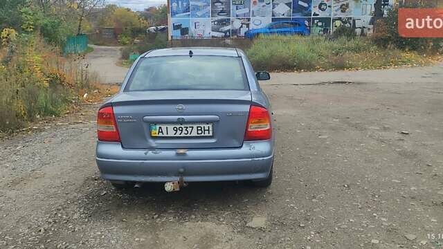 Серый Опель Астра, объемом двигателя 1.4 л и пробегом 250 тыс. км за 3000 $, фото 4 на Automoto.ua