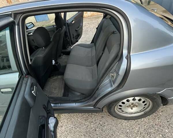 Серый Опель Астра, объемом двигателя 1.4 л и пробегом 228 тыс. км за 4000 $, фото 7 на Automoto.ua