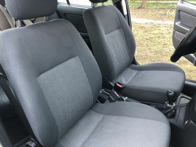 Серый Опель Астра, объемом двигателя 1.4 л и пробегом 207 тыс. км за 3500 $, фото 9 на Automoto.ua