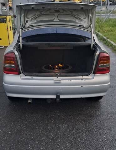 Серый Опель Астра, объемом двигателя 1.39 л и пробегом 202 тыс. км за 3000 $, фото 7 на Automoto.ua