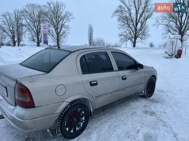 Серый Опель Астра, объемом двигателя 1.4 л и пробегом 300 тыс. км за 2150 $, фото 2 на Automoto.ua