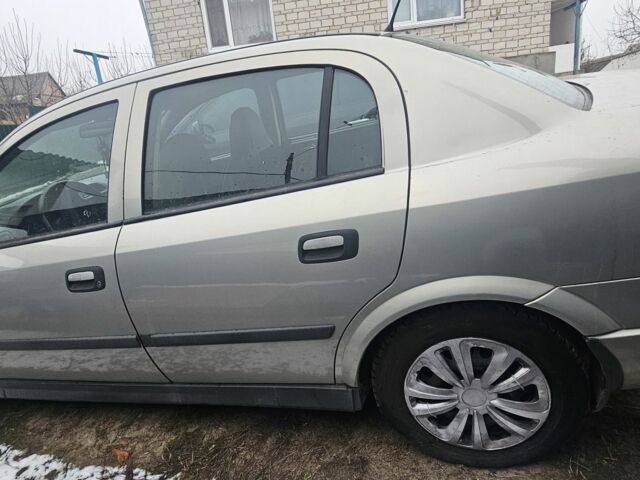 Серый Опель Астра, объемом двигателя 1.6 л и пробегом 60 тыс. км за 3300 $, фото 2 на Automoto.ua