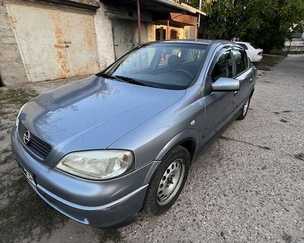 Серый Опель Астра, объемом двигателя 1.4 л и пробегом 228 тыс. км за 4000 $, фото 6 на Automoto.ua