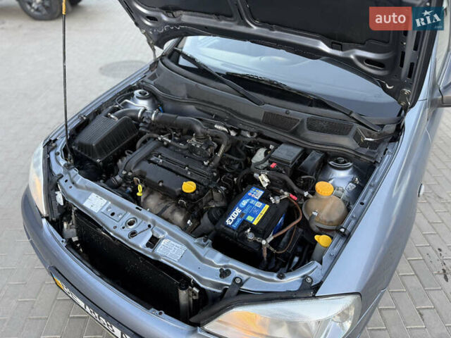 Серый Опель Астра, объемом двигателя 1.4 л и пробегом 139 тыс. км за 4000 $, фото 7 на Automoto.ua