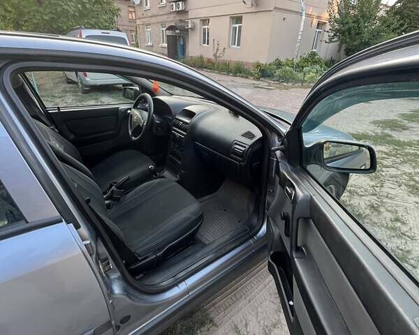 Серый Опель Астра, объемом двигателя 1.4 л и пробегом 228 тыс. км за 4000 $, фото 11 на Automoto.ua