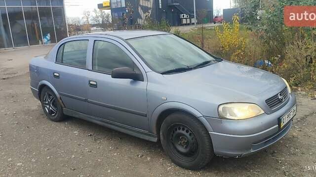 Серый Опель Астра, объемом двигателя 1.4 л и пробегом 250 тыс. км за 3000 $, фото 1 на Automoto.ua