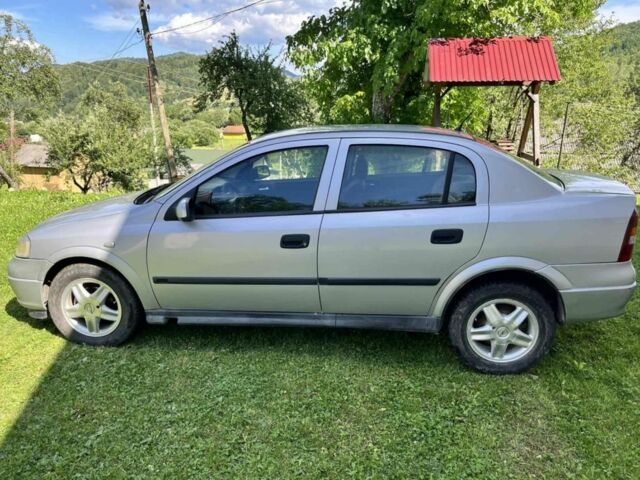 Серый Опель Астра, объемом двигателя 1.6 л и пробегом 170 тыс. км за 3100 $, фото 2 на Automoto.ua