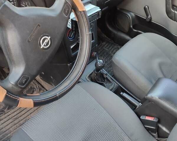 Серый Опель Астра, объемом двигателя 1.4 л и пробегом 400 тыс. км за 2600 $, фото 3 на Automoto.ua