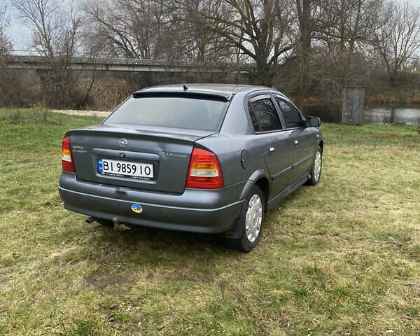 Серый Опель Астра, объемом двигателя 1.4 л и пробегом 270 тыс. км за 3500 $, фото 3 на Automoto.ua