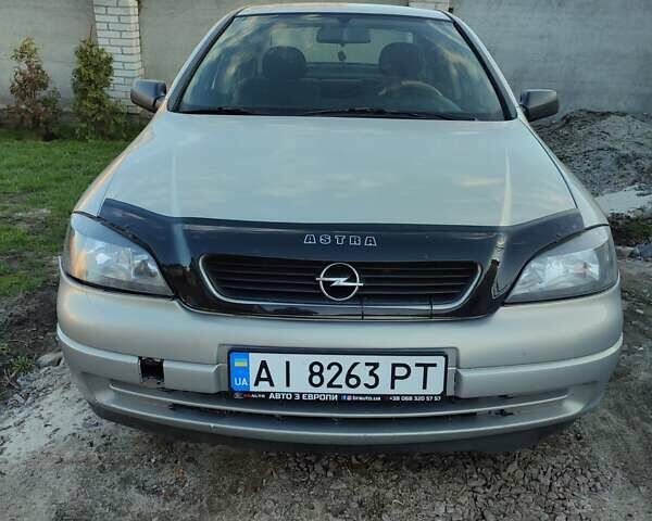 Серый Опель Астра, объемом двигателя 1.4 л и пробегом 400 тыс. км за 2600 $, фото 2 на Automoto.ua