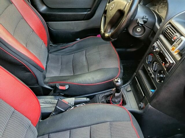 Серый Опель Астра, объемом двигателя 1.4 л и пробегом 342 тыс. км за 2200 $, фото 1 на Automoto.ua