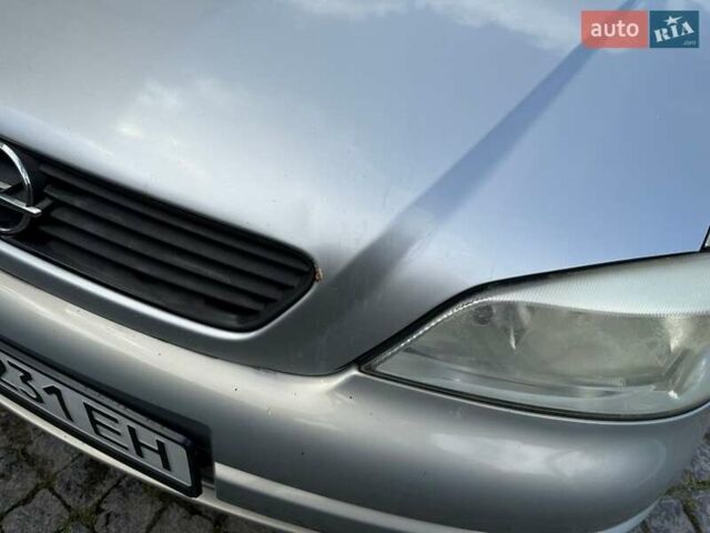 Серый Опель Астра, объемом двигателя 1.4 л и пробегом 211 тыс. км за 3200 $, фото 6 на Automoto.ua
