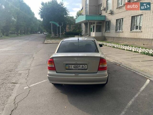 Сірий Опель Астра, об'ємом двигуна 1.6 л та пробігом 59 тис. км за 6000 $, фото 3 на Automoto.ua